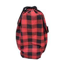 Load image into Gallery viewer, Make reusable gift wrapping a fun part of your holiday traditions.  This classic buffalo plaid print also makes a beautiful addition to your festive seasonal decor.  ﻿Perfect for delivering gifts to family celebrations or wrapping those oversized gifts that paper just can&#39;t handle.