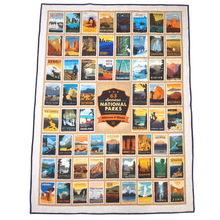 Load image into Gallery viewer, Beautiful handmade quilts  are the perfect addition to the home or as a gift to a national parks enthusiast. This large panel features the 63 American National Parks Wilderness &amp; Wonder patch surrounded by a patchwork of 63 unique national park posters.  Sewn with coordinating binding and quilted in a topography pattern for a stunning finish. Finished size: 54&quot; x 72. Product designed and sewn by AdventureUs 2022 in Northern Wisconsin Artwork Anderson Design Group, Inc. All rights reserved.