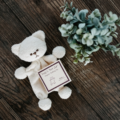 This soft and cuddly organic cotton teething bear makes the perfect new baby gift.