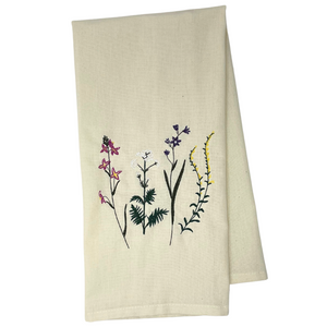 One 28" x 20" towel 5" x 5" design of colorful flowers Embroidered in Washburn, WI, USA