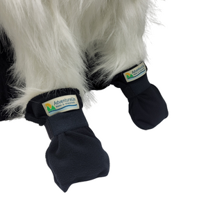 Cozy fleece booties with soft elastic for a gentle, secure fit. Soft fleece fabric for warmth and coziness. Ideal for cold weather or to protect paw injuries. For a durable layer that's perfect for wet, muddy or rough ground try our Rugged Pet Booties. Made by AdventureUs in Washburn, WI Color: Black