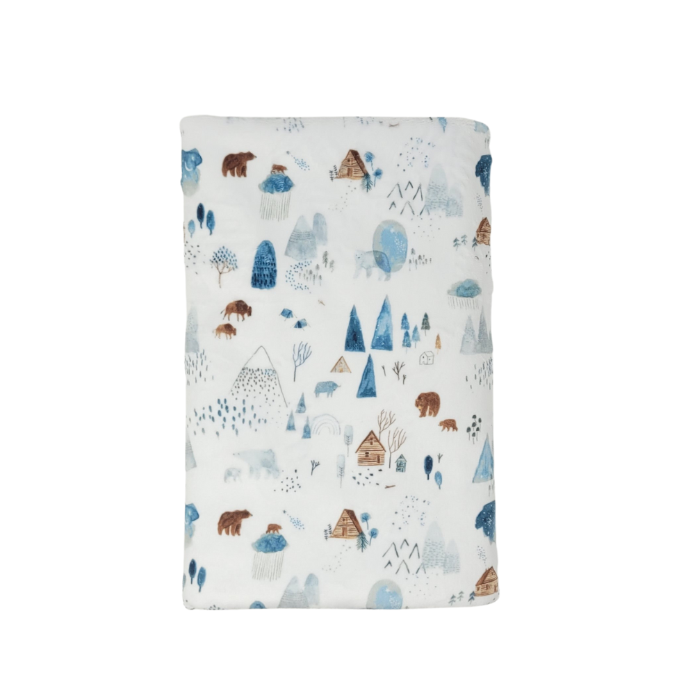 This luxurious micro fleece blanket is handcrafted in Wisconsin, USA from the softest suede-style minky fabric, creating a cozy, double-layered comfort that will soothe even the most weary traveler. A truly special item, perfect for snuggling and gifting.  Double Layer Lux micro minky in two sizes: Cuddle 28