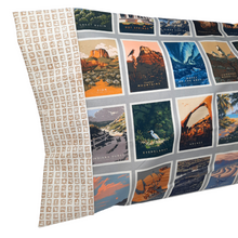 Load image into Gallery viewer, Brighten up your favorite sleep space with a beautiful, soft pillowcase.  This pillowcase is a perfect gift for the National Parks enthusiast in your life.  Standard Size measures 30&quot; x 20&quot; One pillowcase Washing Instructions: Machine Wash Cold/Tumble Dry Low Product designed and sewn by&nbsp;AdventureUs in Northern Wisconsin  Materials: 100% cotton&nbsp;Riley Blake Designs™ National Parks Badges fabric