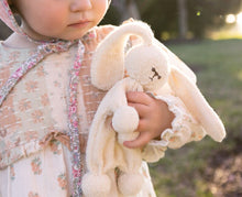 Load image into Gallery viewer, This original handmade bunny will become a beloved cozy toy for baby. The texture provides relief from sore or itchy gums due to teething, as well as encourage tactile exploration. The flat body is easy for baby to hold on to while soothing teething pains.