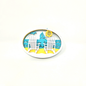 Lakeside Sailing Souvenir Magnet complete with Adirondack Chairs  This beautiful layered wood cut magnet is the perfect souvenir from your Lake Superior adventures in iconic Apostle Islands, Bayfield, Washburn, and Ashland -  Wisconsin.  Size: 3" x 2.25"