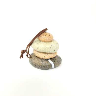 Reminisce about your days at the beach with this beautiful holiday ornament.  Perfect souvenir from your Lake Superior adventures in iconic Apostle Islands, Bayfield, Washburn, and Ashland areas in Wisconsin. Rock Cairn Stacked Stones Ornament Size W 2.5