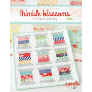 This fun pattern has instructions for making a 14" by 16" mini quilt but you can make as many spools as you like to make it bigger. Block size is 3.5" by 4.5" making it a perfect pattern for using charm squares or scraps.
