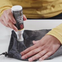 Load image into Gallery viewer, Restore your tent or coated fabrics in a snap with this easy Gear Aid Sealant.  This clear sealant makes tent waterproofing hassle-free with its built-in foam applicator brush. Over time, the protective waterproofing on a tent floor, rain fly, or tarp wears out and begins to flake off.  When a rainfly gets sticky or backpacks start delaminating, make them perform again with Seam Grip TF Tent Fabric Sealant.
